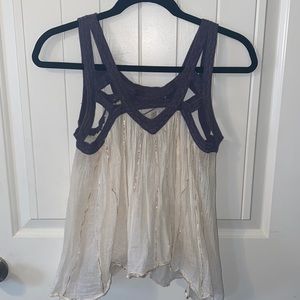 Tank with gold accents and purple top